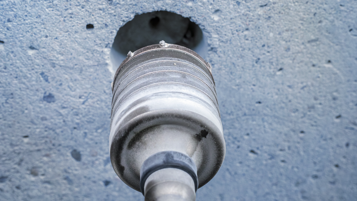 Object #200476157: 3065450_app_web_6 Core drill bit making a hole in a concrete wall.